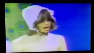 Wearing a diaper and bonnet to replace lost baby pictures