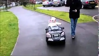 Ride on electric car for children. Black Black Audi.