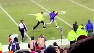 Moment Chiefs security guard dives to tackle a Broncos fan