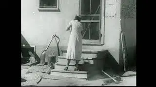 Woman Sweeping Front Steps After Dust Storm (1936) | Daily Life Amid Dust Bowl Hardship