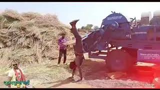 dancing while thressing the crops