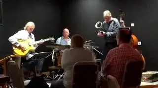 Mike Piggott pulls a chicken out of an amped violin