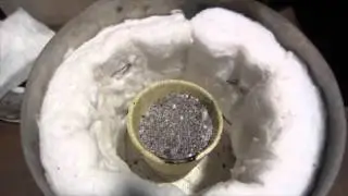 Loading the Crucible up with Roasted Gold Ore and Flux