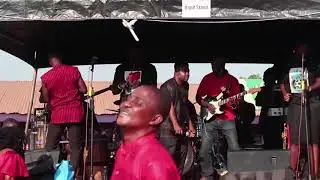 ADOFO JNR STORMS HIS MUM'S FUNERAL WITH THE SONG HE WROTE FOR HIS MUM