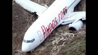 Passenger plane dangles off cliff after skidding off runway in Turkey