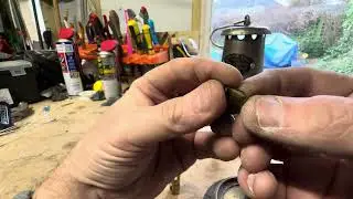 Removing and replacing the wick on a Wolf 7RMBS lamp.