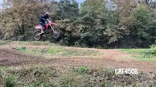 Riping a CRF450R on a muddy track