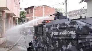 Police fire tear gas and water cannon during protest in Honduras