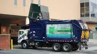 Fairfax County Front Loader Cleaning Out George Mason University