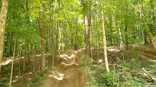 Braydon climbing a hill at Tecumseh Trails