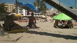 Ibiza - Guy playing Djembe at Figueretas beach