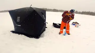A Couple Amateurs Ice Fishing on Birch Lake, Alberta