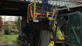 Dachreinigung mit Kramer 118 Radlader und Arbeitskorb nebst fleissigen HelferInnen.