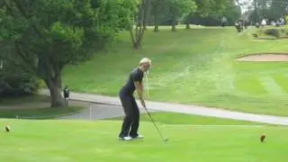 Di Stewart setting up a birdie