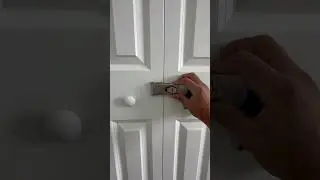 Bi-folding door closet lock with key