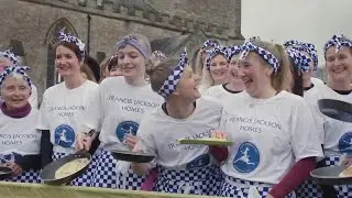 English town flips out for centuries-old Shrove Tuesday pancake race