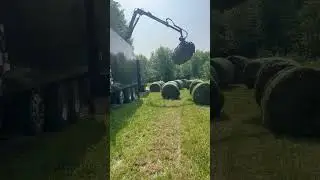 Moving round bales with the debris truck. #farming #johndeere #rotobec #westenstar #heavyequipment