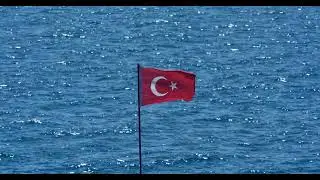 Turkish Flag Waving in Front of the Sea Background | Relaxing Ocean View