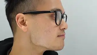 Male model wearing Ray-Ban RB7159 glasses Eyewear