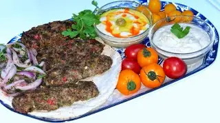 Travel to Turkey in your kitchen! This authentic Adana Kebab recipe is simple & sizzling.