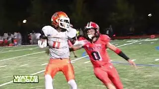 Friday night lights under the rain. Coolidge High vs. Dunbar High. N.W DC High School Football.