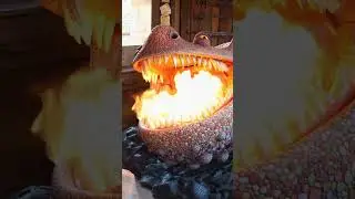 Slow motion of a fire breathing dragon.
