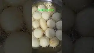 Golden balls of happiness soaked in sugar syrup 🤎 #song #love#indian dessert#food#ytshorts#shorts