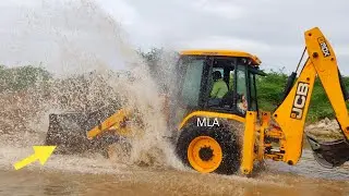 Amazing !! JCB Backhoe Machine Washing in River and Showing Stunt - JCB Operator Cleaning JCB