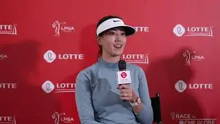 Golfer Michelle Wie reacts to Tiger Woods' win at the Masters