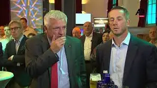 Scholz's SPD celebrate as exit polls suggest they are narrowly ahead of far-right AfD