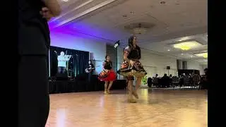 Ashley Harris and Felicia Morrisseau dancing the Red River Jig with Blain Constant on fiddle