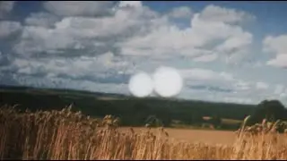 A Crop circle being created by a UFO for the first time caught on film