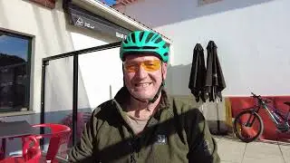 Stopping at a village cafe during my ride. Talking with some lambs.