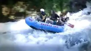 Paddle Inn Rafting Co. Guides Running Big Wesser in a 4 man.