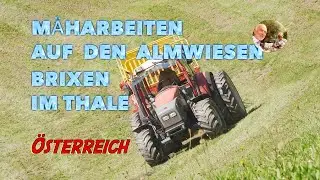 Landwirt bei M&auml;harbeiten im Steilhang unter extremen Bedingungen auf Almwiesen Tirol &Ouml;sterreich