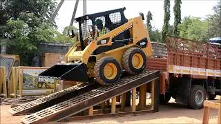 CAT 216B3 Machine Loading & Unloading