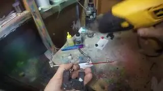 Clear coating a custom painted lure with BSI epoxy.