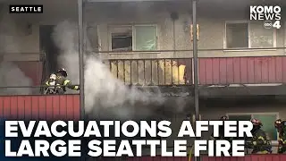 Large apartment fire in Seattle forces evacuations and heavily damages units
