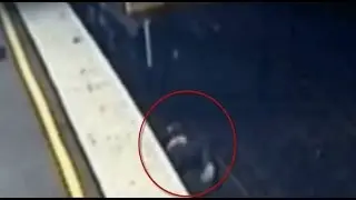Teen Cheats Train Station Death Falling On Tracks Under Moving Train (CCTV Footage)