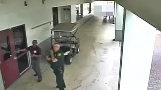 Video Shows Armed Deputy Waiting Outside School During Parkland Shooting: Cops