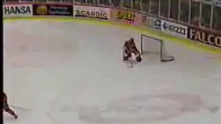 Finnish ice hockey goalkeeper Jarmo Myllys make a goal