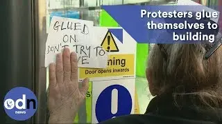 Anti-fracking protesters glue themselves to government building