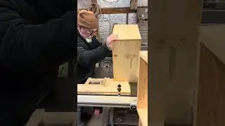 Cutting handles in 8 frame beehive boxes using a jig.