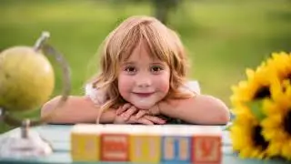 Behind the scenes of a children's back to school photo shoot.