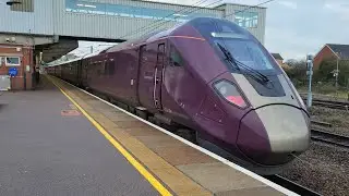 EMR Aurora 810 004 departing Peterborough 