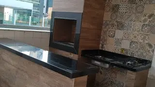 churrasqueira gourmet com acabamento em porcelanato e balc&atilde;o de granito!!