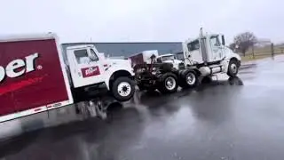 Towing a Dr Pepper truck to the junk yard.￼