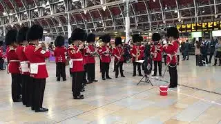 Band of the Scots Guards play &ldquo;Rolling in the Deep&rdquo; at London Paddington Station