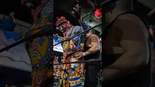 Officer Colt frisks Ruffo the Clown at Only Wrestlers Chicago