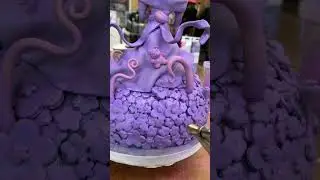 Airbrushing my new sculpture with purple